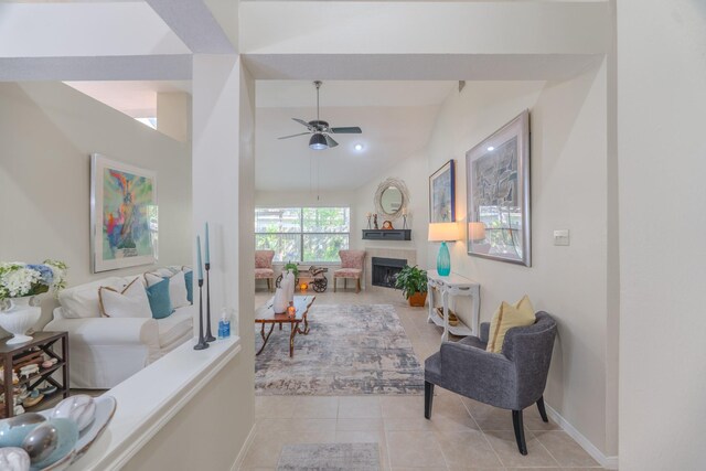 3511 Lost Oak Dr, Spring, TX 77388 - living room with light tile patterned flooring, ceiling fan, a fireplace, baseboards, and lofted ceiling