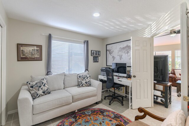 3511 Lost Oak Dr, Spring, TX 77388 - office area featuring light tile patterned floors, a ceiling fan, and a healthy amount of sunlight
