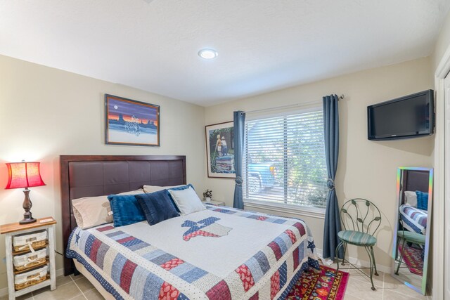 3511 Lost Oak Dr, Spring, TX 77388 - bedroom featuring baseboards, recessed lighting, and light tile patterned floors