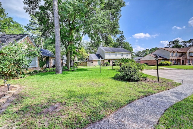 view of yard featuring a residential view