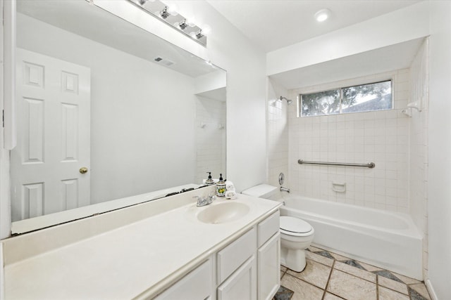 full bath featuring toilet, visible vents, bathing tub / shower combination, and vanity