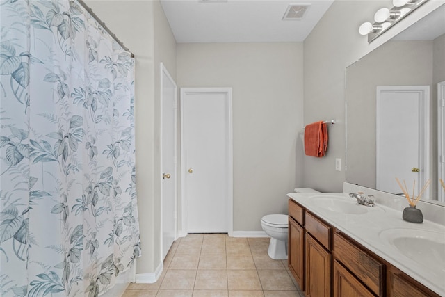 full bathroom with a sink, tile patterned flooring, toilet, baseboards, and visible vents