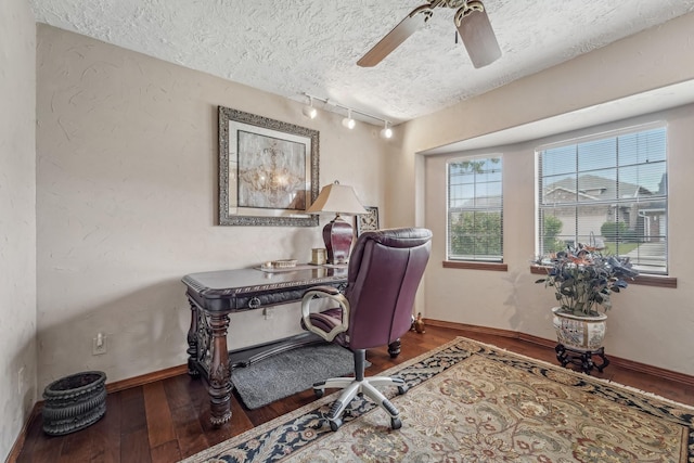 office with wood-type flooring, baseboards, ceiling fan, a textured ceiling, and rail lighting