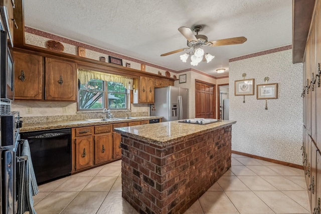 kitchen with a ceiling fan, a center island, fridge with ice dispenser, a sink, and dishwasher