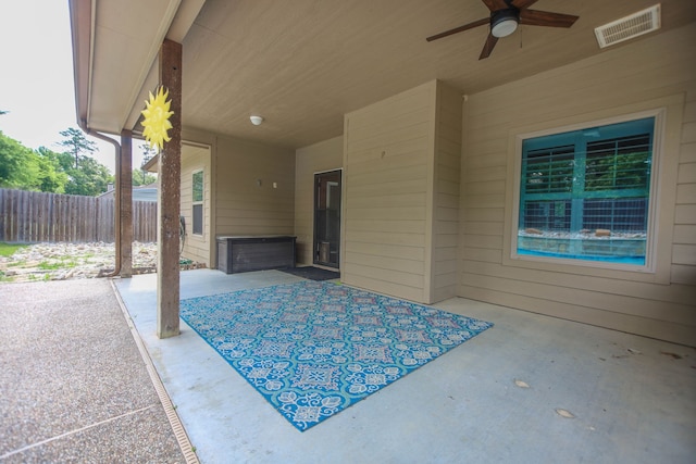 view of patio / terrace with visible vents, a ceiling fan, and fence