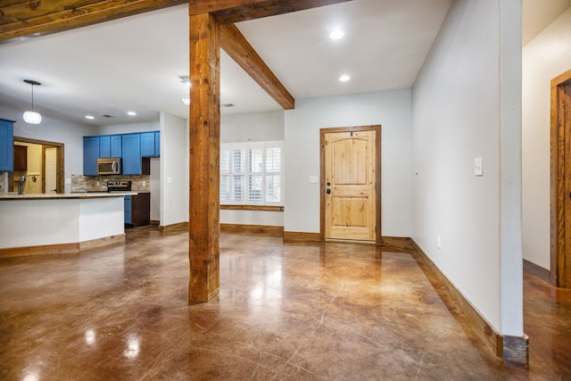 foyer entrance with finished concrete flooring, baseboards, recessed lighting, and beam ceiling
