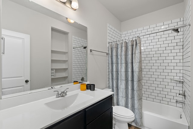 full bath with vanity, shower / tub combo with curtain, and toilet