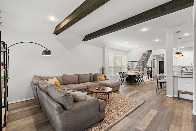 living area featuring baseboards, recessed lighting, stairs, and dark wood-style flooring