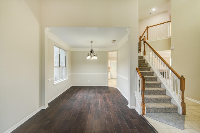 107 Mango St, Lake Jackson, TX 77566 - interior space with baseboards, a notable chandelier, and stairway