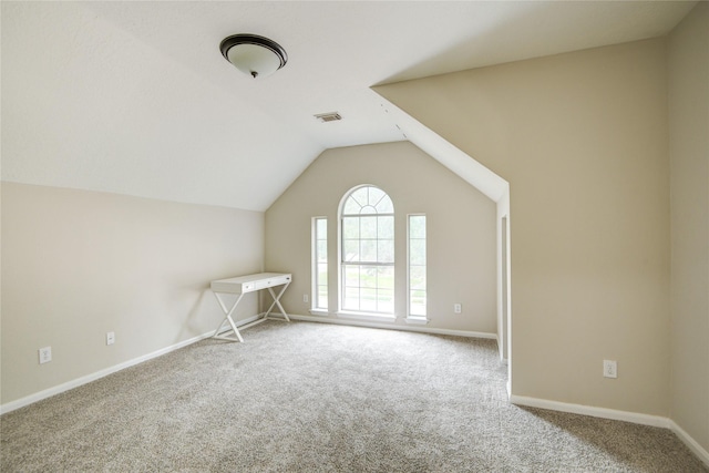 107 Mango St, Lake Jackson, TX 77566 - bonus room featuring visible vents, baseboards, carpet, and lofted ceiling
