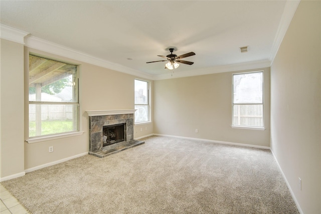 107 Mango St, Lake Jackson, TX 77566 - unfurnished living room with crown molding, baseboards, ceiling fan, and a wealth of natural light