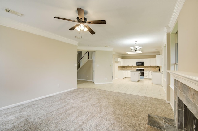 107 Mango St, Lake Jackson, TX 77566 - unfurnished living room featuring crown molding, stairway, light colored carpet, and visible vents