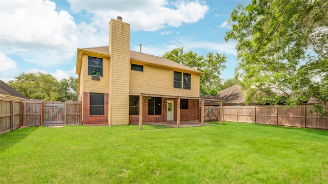 107 Mango St, Lake Jackson, TX 77566 - rear view of house featuring brick siding, a fenced backyard, a gate, a chimney, and a patio