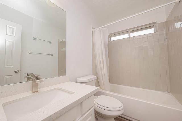bathroom with vanity, toilet, and shower / tub combo