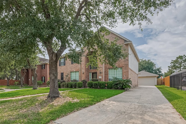 15014 Cabin Run Ln, Sugar Land, TX 77498 - view of front of home with brick siding and a detached garage