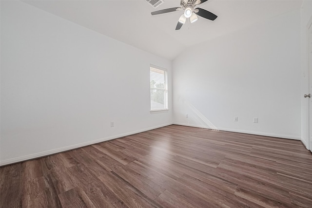 15014 Cabin Run Ln, Sugar Land, TX 77498 - spare room with dark wood-style flooring, a ceiling fan, baseboards, and lofted ceiling