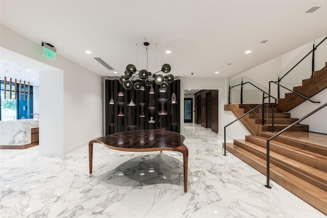 interior space featuring stairs, recessed lighting, and marble finish floor