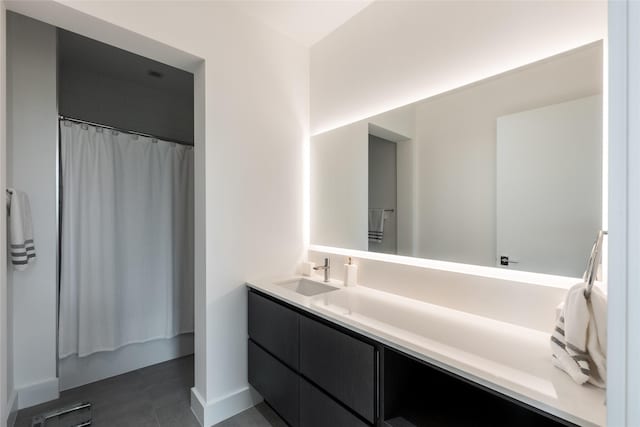 bathroom with vanity, a shower with curtain, and tile patterned floors
