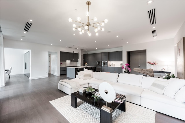 living area with recessed lighting, dark wood-style floors, and visible vents