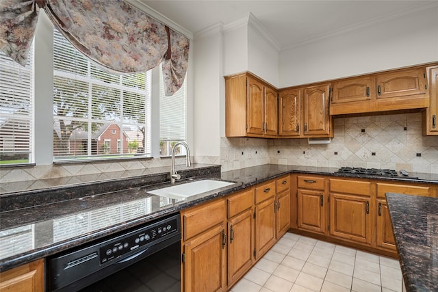 4423 Nassau Dr, Sugar Land, TX 77479 - kitchen featuring brown cabinetry, gas cooktop, a sink, dark stone countertops, and dishwasher