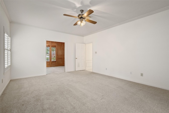 4423 Nassau Dr, Sugar Land, TX 77479 - unfurnished room featuring crown molding, baseboards, ceiling fan, and light carpet