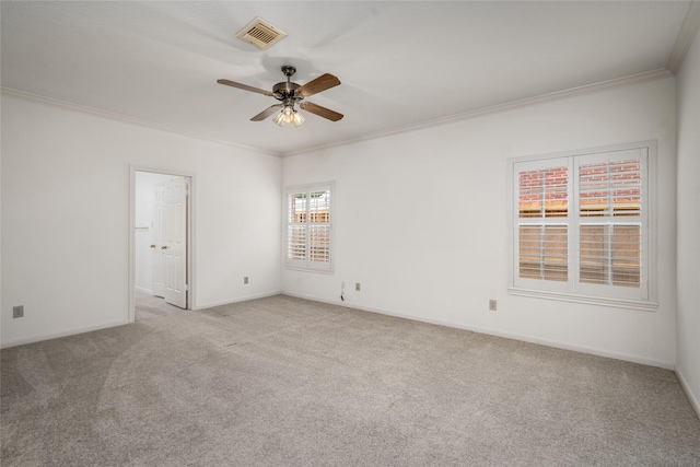4423 Nassau Dr, Sugar Land, TX 77479 - empty room with crown molding, carpet floors, a ceiling fan, baseboards, and visible vents