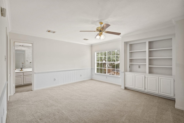 4423 Nassau Dr, Sugar Land, TX 77479 - unfurnished room featuring crown molding, a textured ceiling, visible vents, and ceiling fan