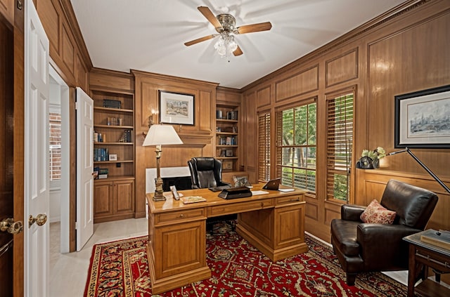 4423 Nassau Dr, Sugar Land, TX 77479 - office area with wooden walls, built in features, ceiling fan, and ornamental molding