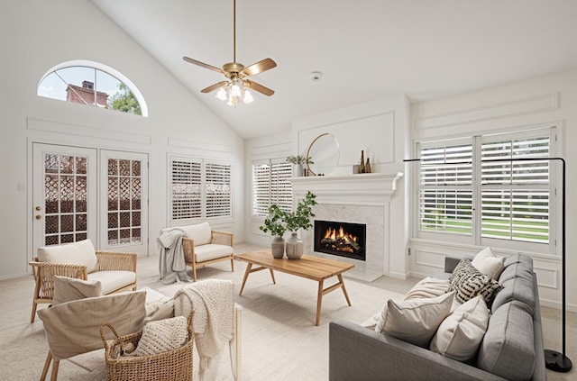 4423 Nassau Dr, Sugar Land, TX 77479 - living room featuring a ceiling fan, carpet flooring, a fireplace, and high vaulted ceiling