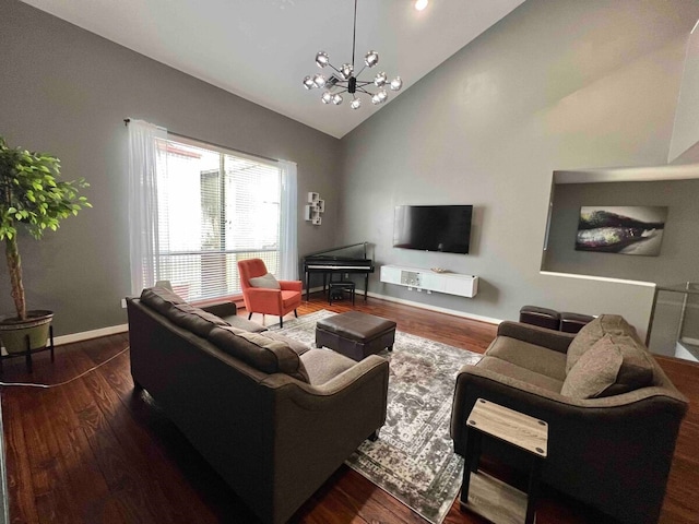 living area with baseboards, high vaulted ceiling, a chandelier, and wood finished floors