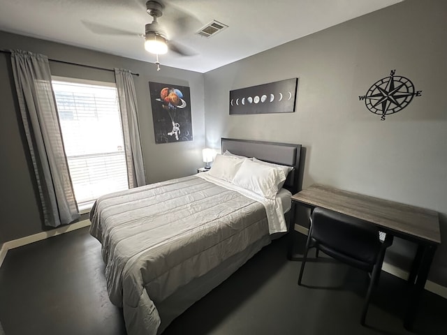 bedroom featuring baseboards, ceiling fan, and visible vents
