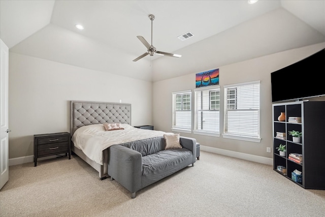 bedroom featuring baseboards, visible vents, light carpet, and vaulted ceiling