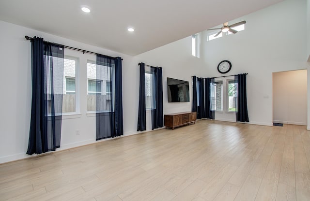 8815 Drysdale River Rd, Cypress, TX 77433 - unfurnished living room featuring recessed lighting, baseboards, ceiling fan, and light wood finished floors