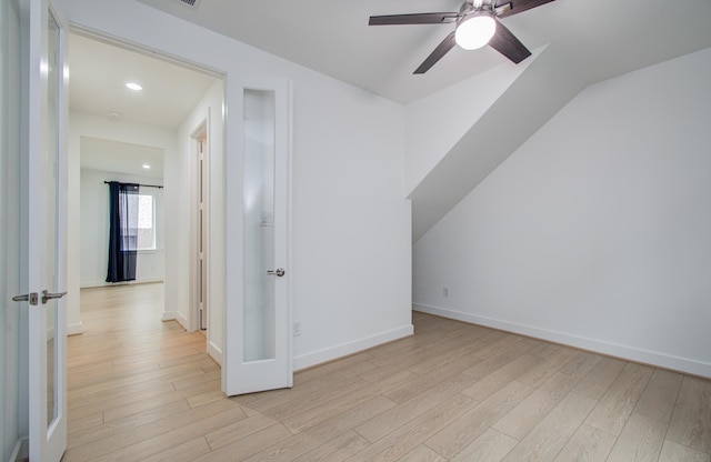 8815 Drysdale River Rd, Cypress, TX 77433 - additional living space featuring baseboards, ceiling fan, recessed lighting, light wood finished floors, and vaulted ceiling