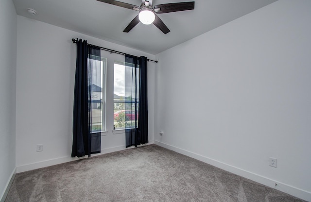 8815 Drysdale River Rd, Cypress, TX 77433 - unfurnished room with baseboards, carpet, and ceiling fan