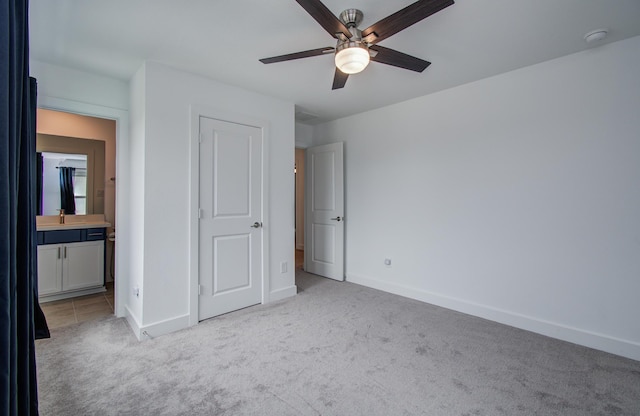 8815 Drysdale River Rd, Cypress, TX 77433 - unfurnished bedroom featuring baseboards, carpet, and ensuite bath