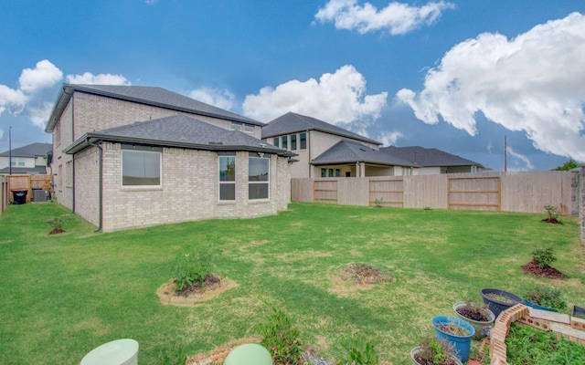 8815 Drysdale River Rd, Cypress, TX 77433 - view of yard with central AC unit and a fenced backyard