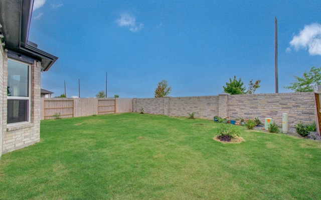 8815 Drysdale River Rd, Cypress, TX 77433 - view of yard with a fenced backyard