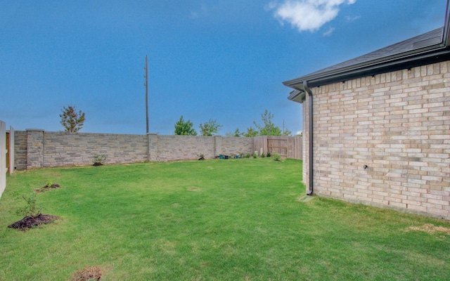 8815 Drysdale River Rd, Cypress, TX 77433 - view of yard featuring a fenced backyard
