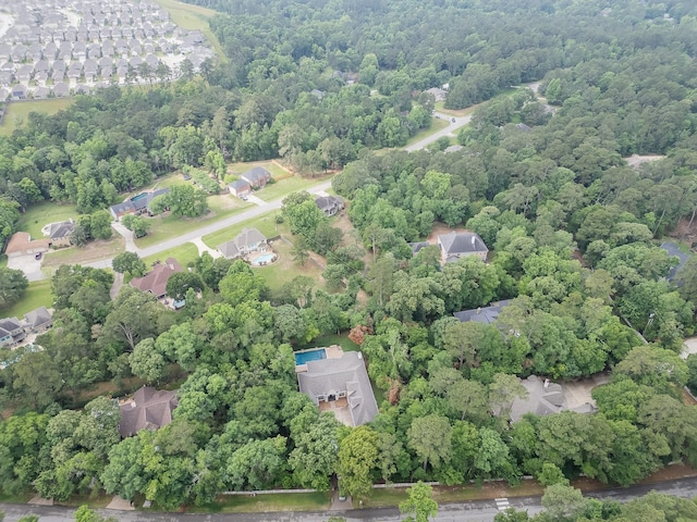 bird's eye view with a view of trees and a residential view