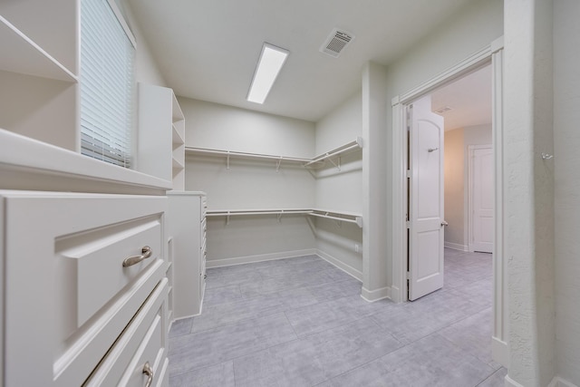 walk in closet featuring visible vents