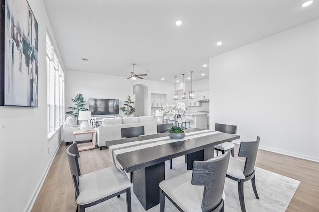 dining space featuring recessed lighting, light wood-style flooring, baseboards, and ceiling fan