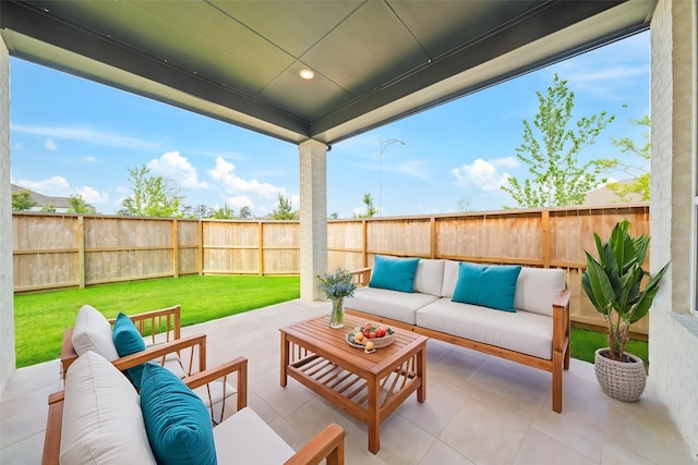 view of patio featuring a fenced backyard and an outdoor living space