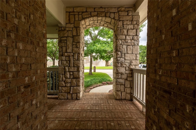 834 Arbor Pne, Tomball, TX 77375 - doorway featuring brick floors