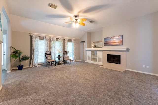 834 Arbor Pne, Tomball, TX 77375 - sitting room featuring vaulted ceiling, ceiling fan, baseboards, carpet floors, and a tiled fireplace
