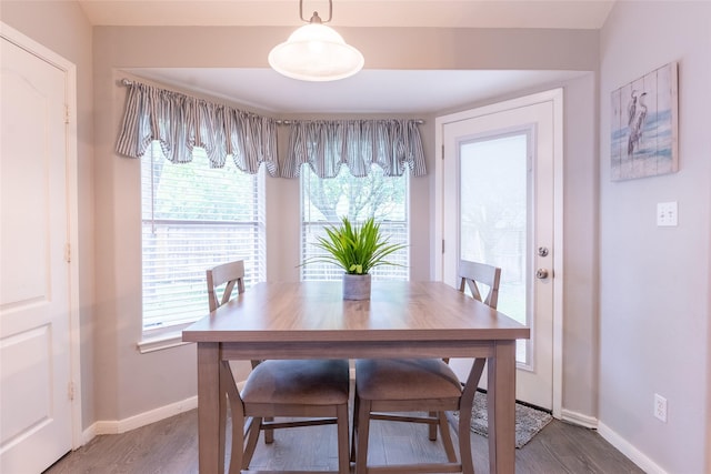 834 Arbor Pne, Tomball, TX 77375 - dining room with baseboards, wood finished floors, and plenty of natural light