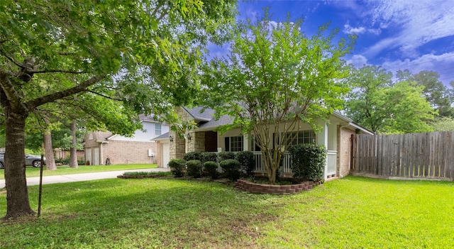 834 Arbor Pne, Tomball, TX 77375 - obstructed view of property with a garage, concrete driveway, brick siding, and stone siding