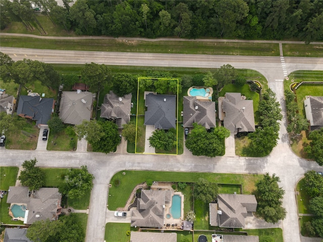 834 Arbor Pne, Tomball, TX 77375 - aerial view of property's location featuring a pool, property boundaries highlighted, and nearby suburban area