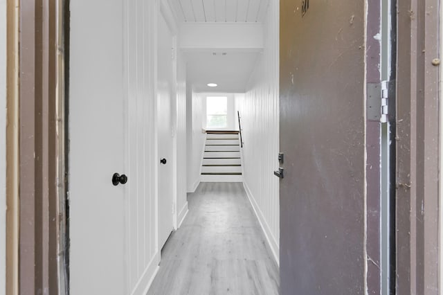 hall with wood finished floors