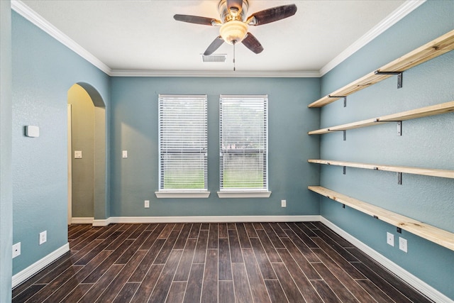 2707 Kings Retreat Cir, Kingwood, TX 77345 - empty room featuring visible vents, a ceiling fan, wood finished floors, baseboards, and arched walkways